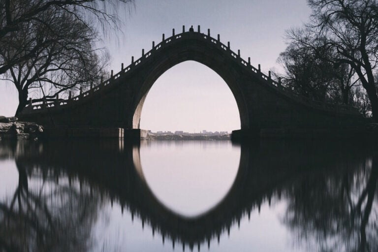 a bridge reflecting the water. Repair attempts